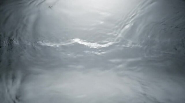 Blurred gray gradient background with bright light at top