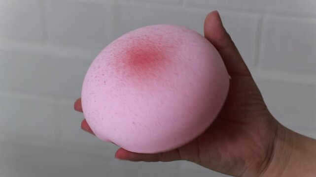 Hand Pressing a Foam Squishy Toy &ndash; Satisfying Slow Motion