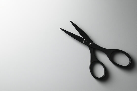 Black office scissors isolated metal blade sharp blade cutting tool stationery tool hand tool black handle open scissor office supply