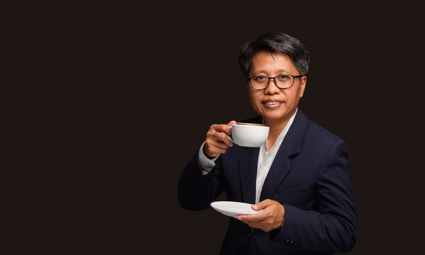 Short haired businesswoman holding coffee cup