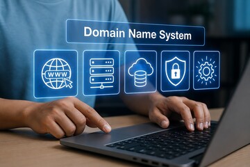 Fototapeta premium Hands typing on laptop with domain name system interface and icons floating above