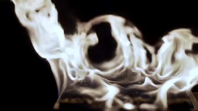 Abstract depiction of vibrant flames dancing in the darkness.
