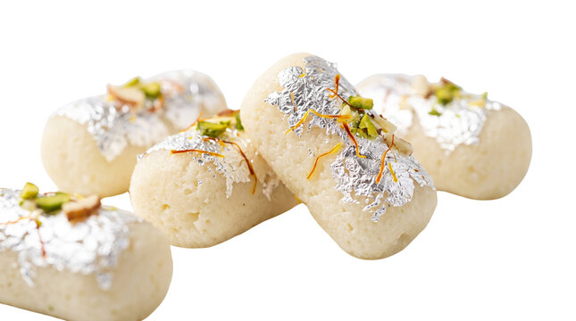Traditional Indian cham cham sweets with silver leaf, authentic Bengali mithai garnished with pistachios and saffron, delicious festive milk dessert isolated PNG with Transparent Background