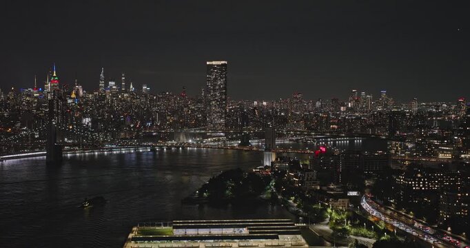 NYC New York Aerial v289 flyover waterfront Brooklyn Heights along East river capturing illuminated bridges and night cityscape of Lower and Midtown Manhattan - Shot with Inspire 3 8k - September 2023