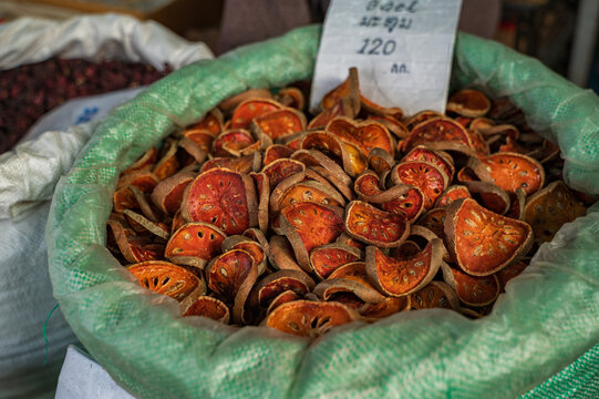 Dried bael fruit slices for herbal tea at Thai market