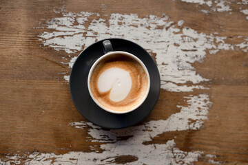 Fototapeta premium Cozy cappuccino from above with film grain aesthetic
