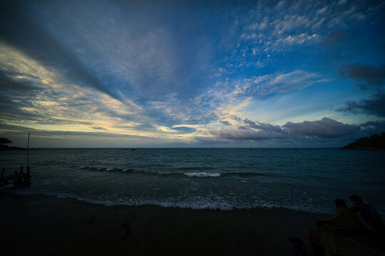 Scenic sunrise over the beach with palm trees at Hon Son Island, Kien Giang, Vietnam.