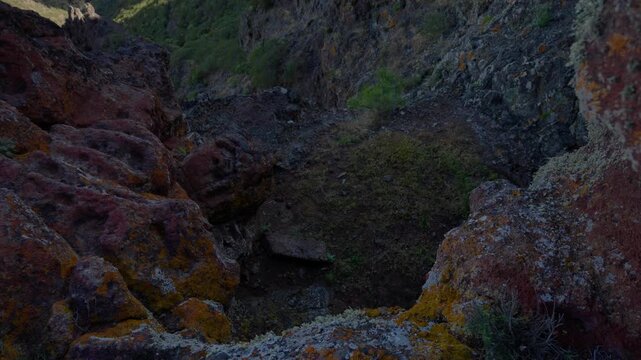 Panning over Masca valley and cave