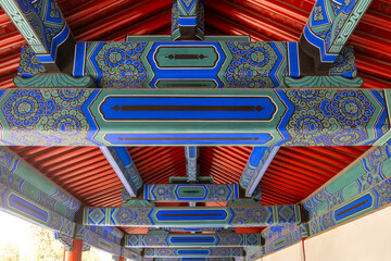 Obraz premium Traditional painted ceiling beams and red rafters at Temple of Heaven Beijing China