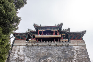 Obraz premium Traditional Chinese pavilion over stone wall at Summer Palace in Beijing China spring
