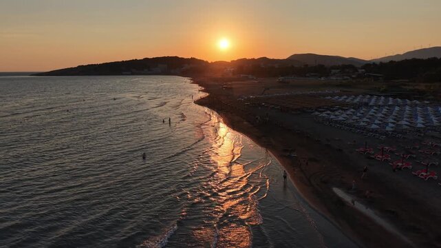 Ulcinj, Montenegro - Jun 29 2026: Aerial video of beaches and the sea during sunset golden hour