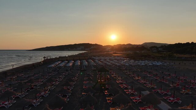 Ulcinj, Montenegro - Jun 29 2026: Aerial video of beaches and the sea during sunset golden hour
