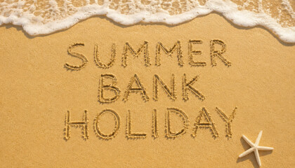 summer bank holiday text in the sand