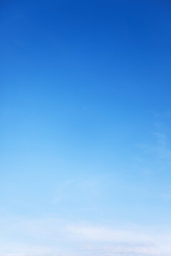 Clear blue sky background and empty space for your design, and gradients shadow vertical shape, copy space (High resolution), real photo