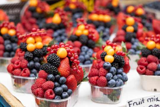 Fresh berry fruit mix cups at Havelska market in Prague