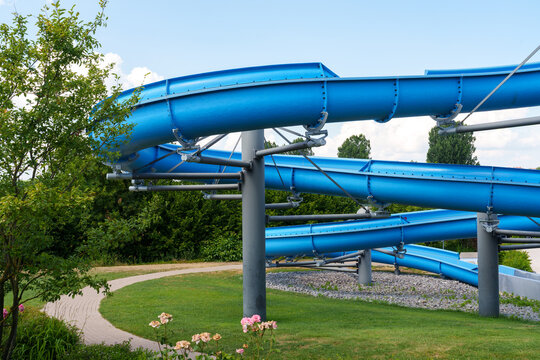 Blue waterslide at outdoor swimming pool