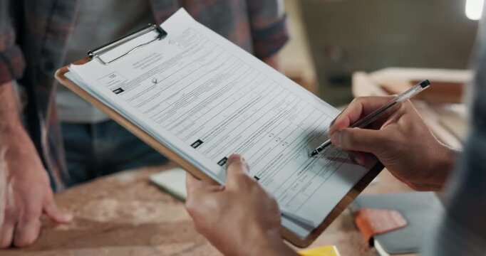 Clipboard, hands and signature in factory for carpentry, logistics and project management. Delivery, people and writing in woodworking warehouse for timber import, compliance and lumber supply chain