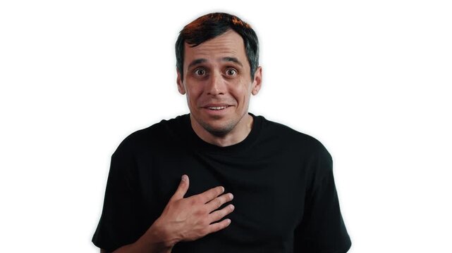 Innocent young man raising empty hands in a gesture of not guilty