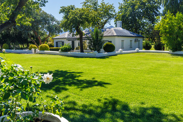 Obraz premium Winery mansion surrounded by greenery in South Africa