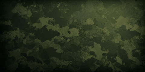A camouflage pattern in muted green and grey tones, ideal for military or hunting themes. © MdShakibAhamed
