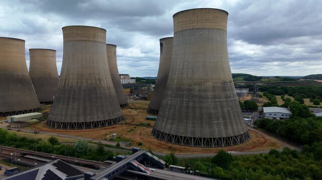Aerial view of massive power station with hyperbolic cooling towers near Nottingham