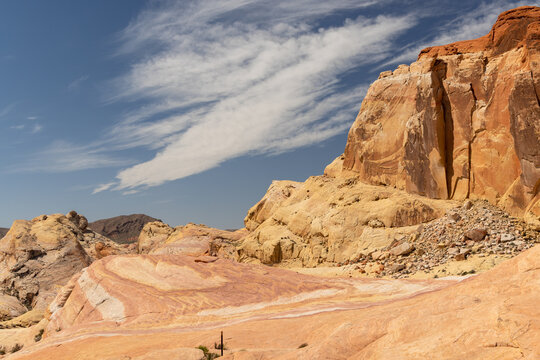 Red sandstone desert cliffs with blue sky dramatic rock landscape