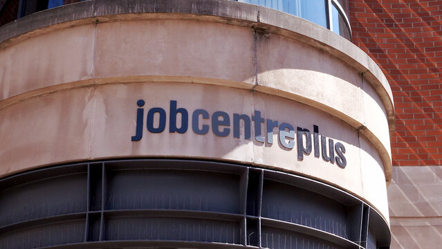Leicester, England, UK - 6 July 2026: Jobcentre Plus sign on government office building, UK employment agency signage on concrete facade, editorial public service office exterior