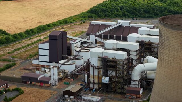 Close up aerial view of the massive flue-gas desulphurisation FGD scrubber unit at a decommissioned power station near Nottingham, UK.