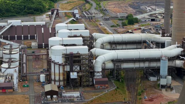 Close up aerial view of the massive flue-gas desulphurisation FGD scrubber unit at a decommissioned power station near Nottingham, UK.