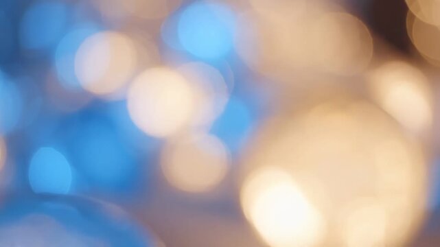 A Captivating Display of Blurred Lights: An Artistic Representation of Colorful Bokeh Patterns with Soft Blue and Warm Amber Hues in a Dreamlike Atmosphere