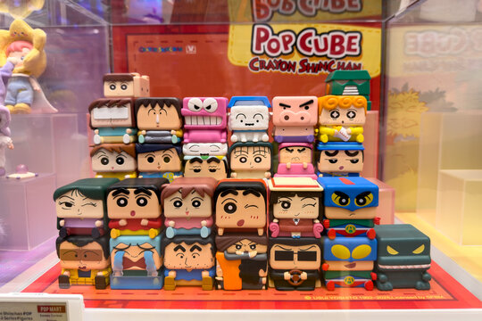 PENANG, MALAYSIA - JUL 03, 2026: Crayon Shinchan Pop Cube collectible figure display inside Pop Mart retail store.