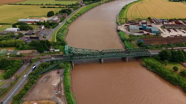 Aerial view of Keadby steel bascule road and railway bridge over River Trent UK