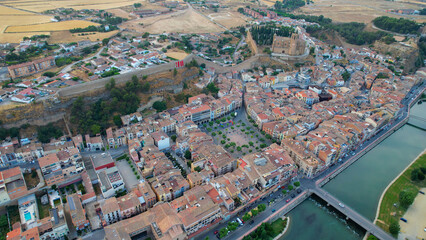 Obraz premium Aerial view of the downtown above the city and Balaguer in Spain, on a sunny spring afternoon.