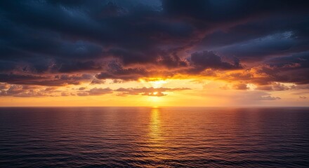 Fototapeta premium Dramatic Sunset Over Calm Ocean Waters