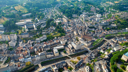 Obraz premium Aerial view of the old town above the city Tulle in France, on a sunny spring afternoon.