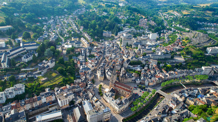 Obraz premium Aerial view of the old town above the city Tulle in France, on a sunny spring afternoon.