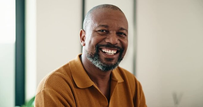 Face, laughing and weekend with black man in home living room for break, me time or wellness. Funny, morning and proud with mature person in apartment for holiday, peace or relax on Saturday