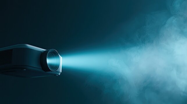 A modern projector emits a bright blue light beam through smoky air