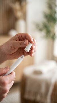 Anonymous Hands Holding Generic Medical Device, Daily Healthcare and Self Care Routine Concept