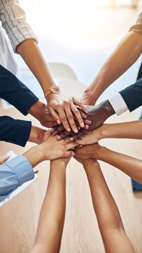 Team hands together.