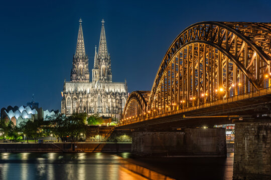 Cologne, Germany &ndash; April 25, 2026: Cologne Cathedral and Hohenzollern Bridge at sunset, Cologne (K&ouml;ln), Germany