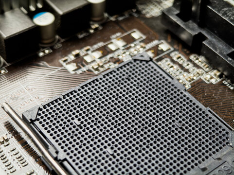 Computer motherboard showing cpu socket and electronic components