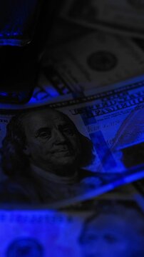 Police seized illegal money, smuggling. A close-up of the shadow market and dirty dollar bills used by criminals and scammers for laundering.