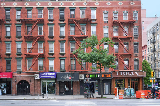 East Village area of Manhattan, old apartment buildings with stores on ground floor