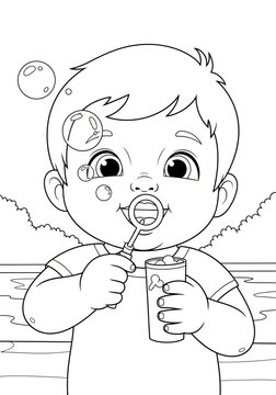 Toddler drinking from cup with straw at beach.