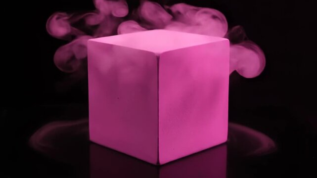 A solid pink cube rising from a dense layer of smoke with swirling neon pink vapor against a black background