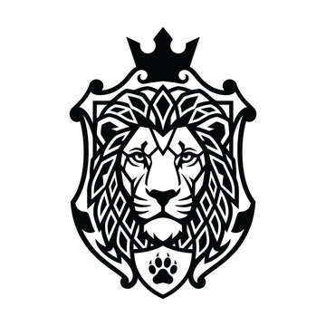 Lion face with crown in ornate shield vector logo