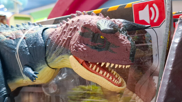 Jurassic World Carnotaurus dinosaur action figure toy inside retail packaging box on July 3, 2026 in Bangkok, Thailand
