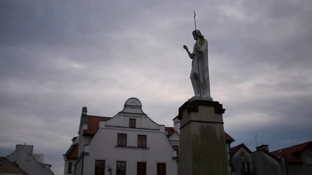 Statue of Christ about Church of Sts. John the Baptist in Pisz