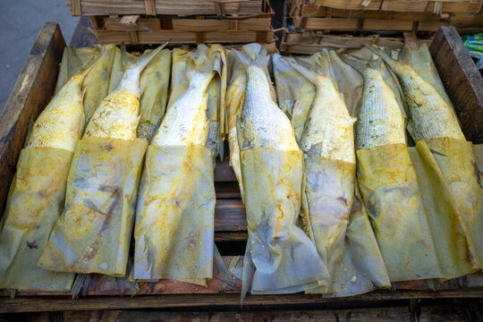 Bandeng, Milkfish or Chanos chanos in woven bamboo baskets at traditional markets in Indonesia